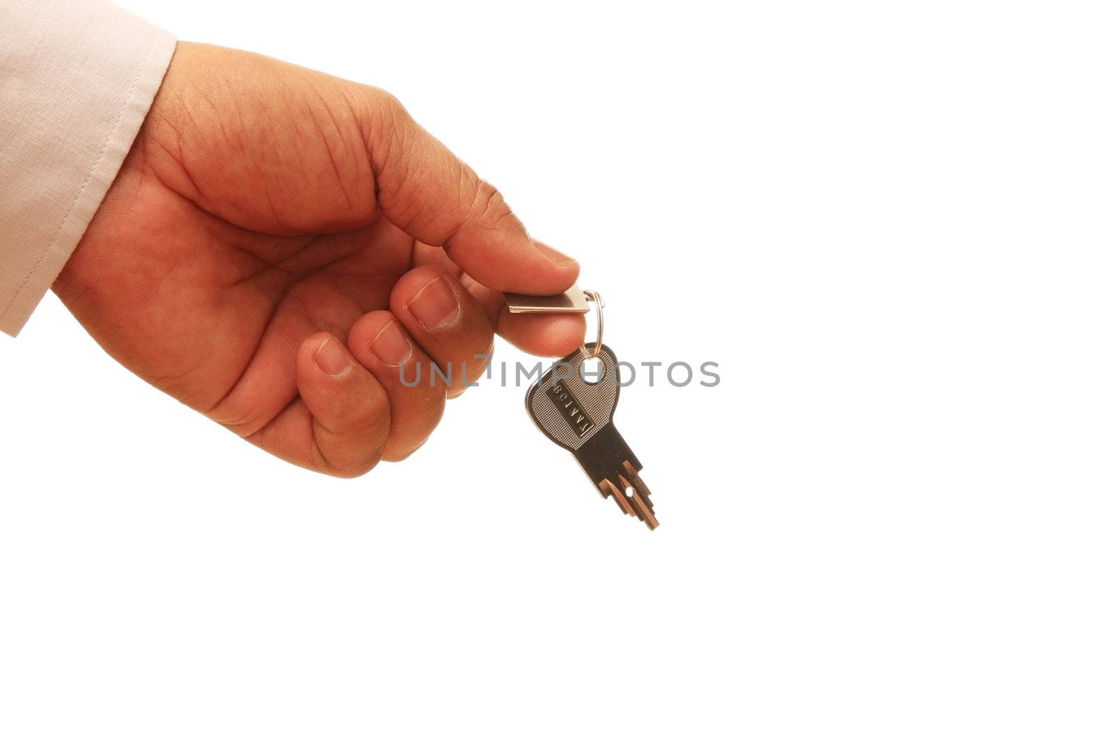 close up of a person's hand handing over the key over white background.