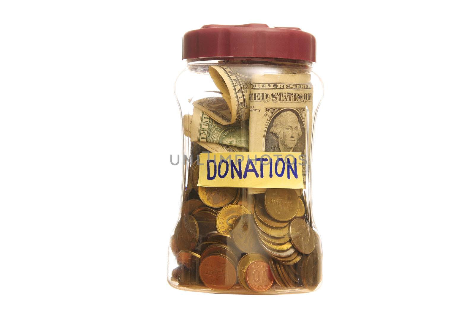 Donation in a closed Jar over a white background.