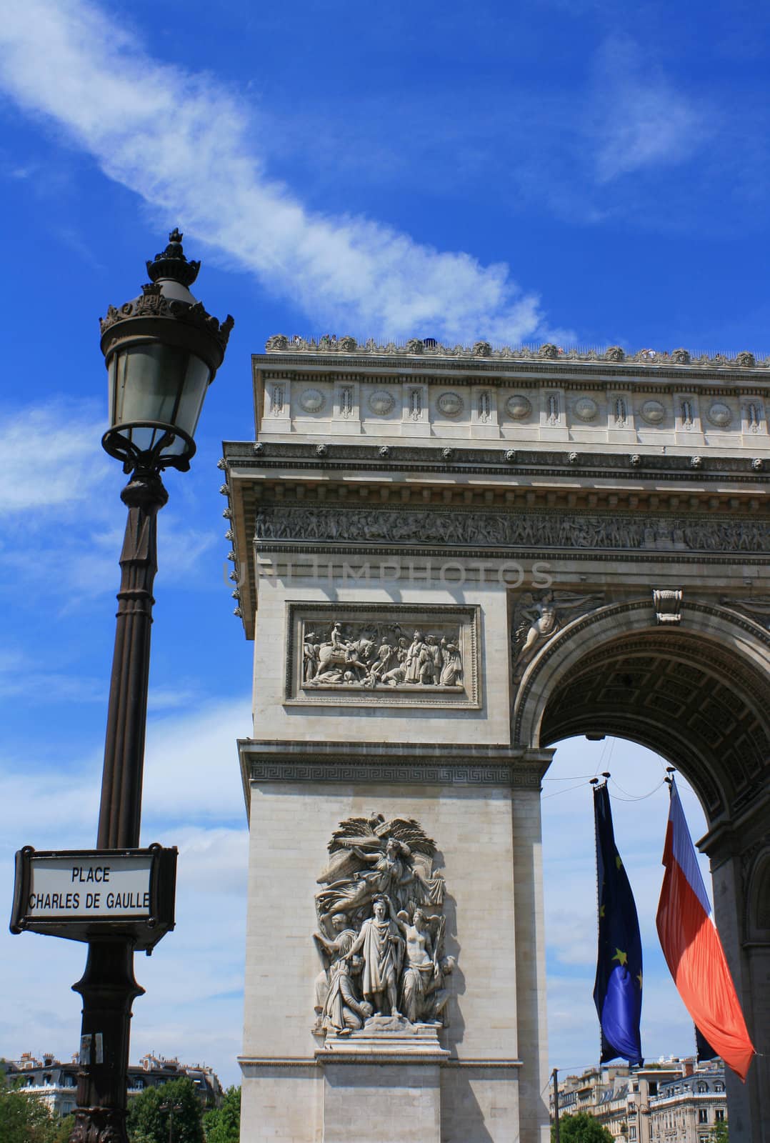 Left hand section of the Arc De Triumph, Paris France, with street sign post - 'Place Charles De Gaulle'