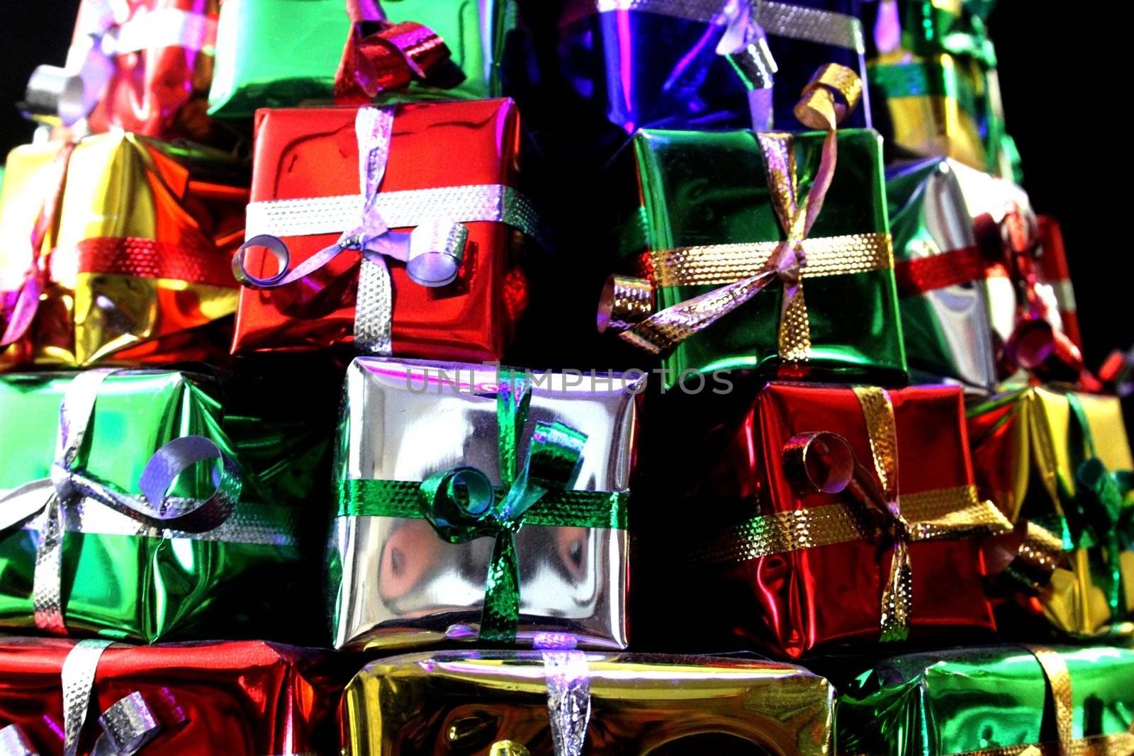 close up of wrapped gifts stacked as a pyramid