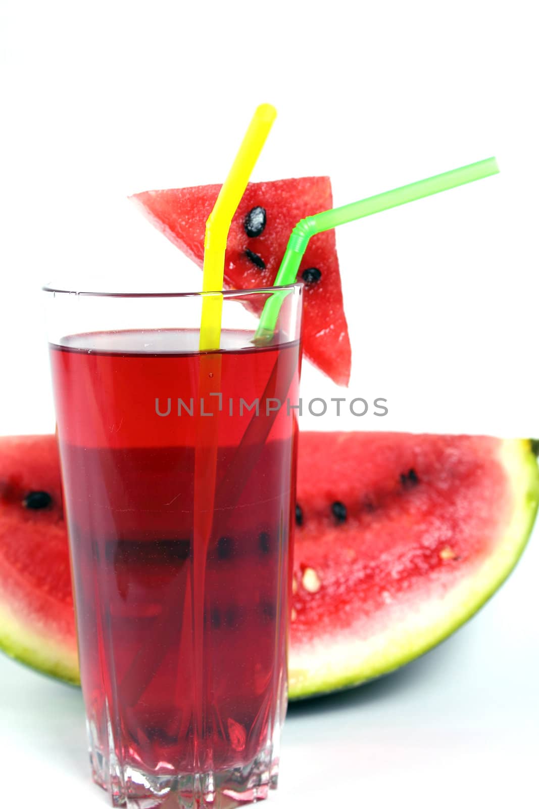 Shot of red refreshing watermelon drink on white background