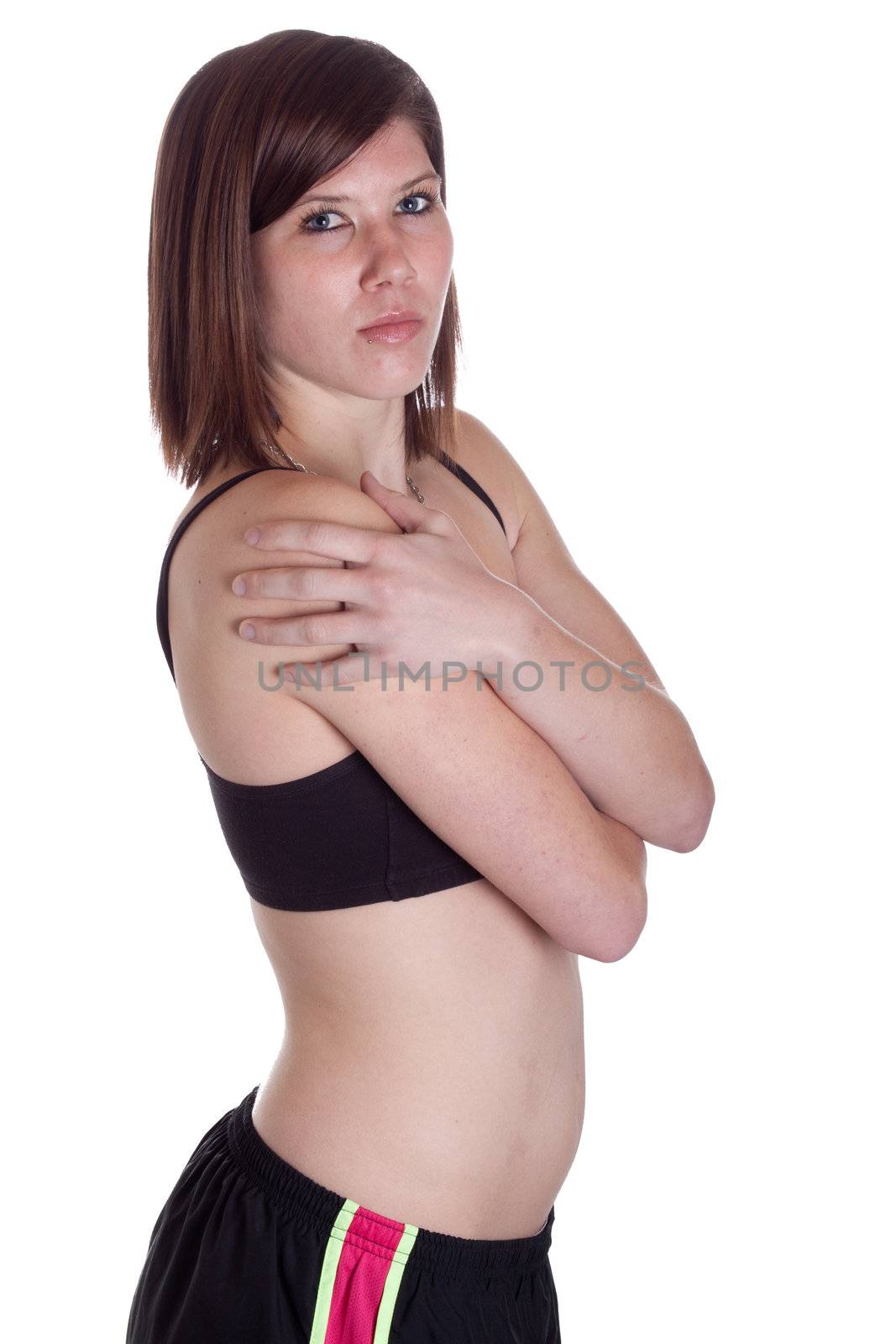 A girl is warming up before working out.