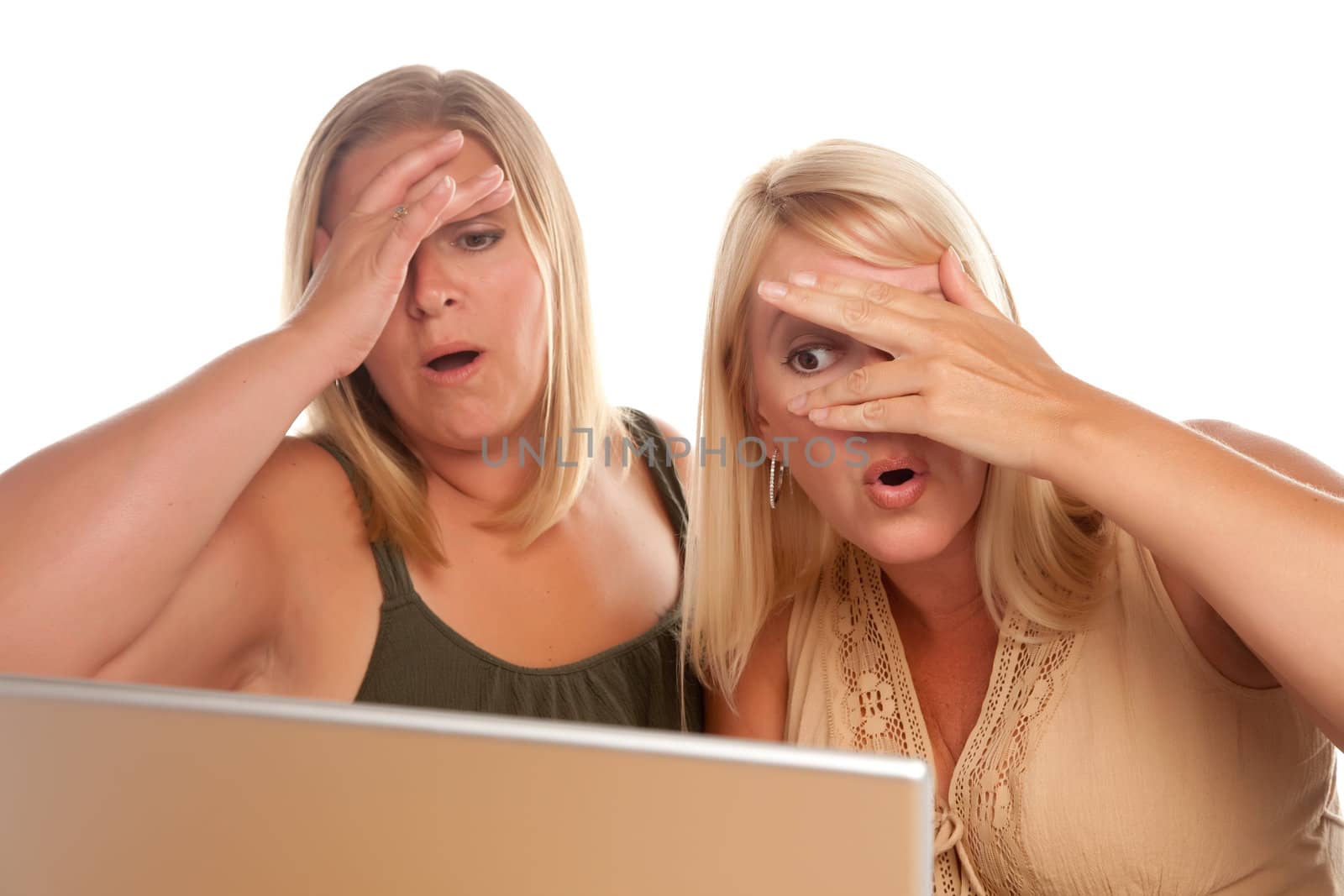 Two Shocked Women Using Laptop Isolated on a White Background.