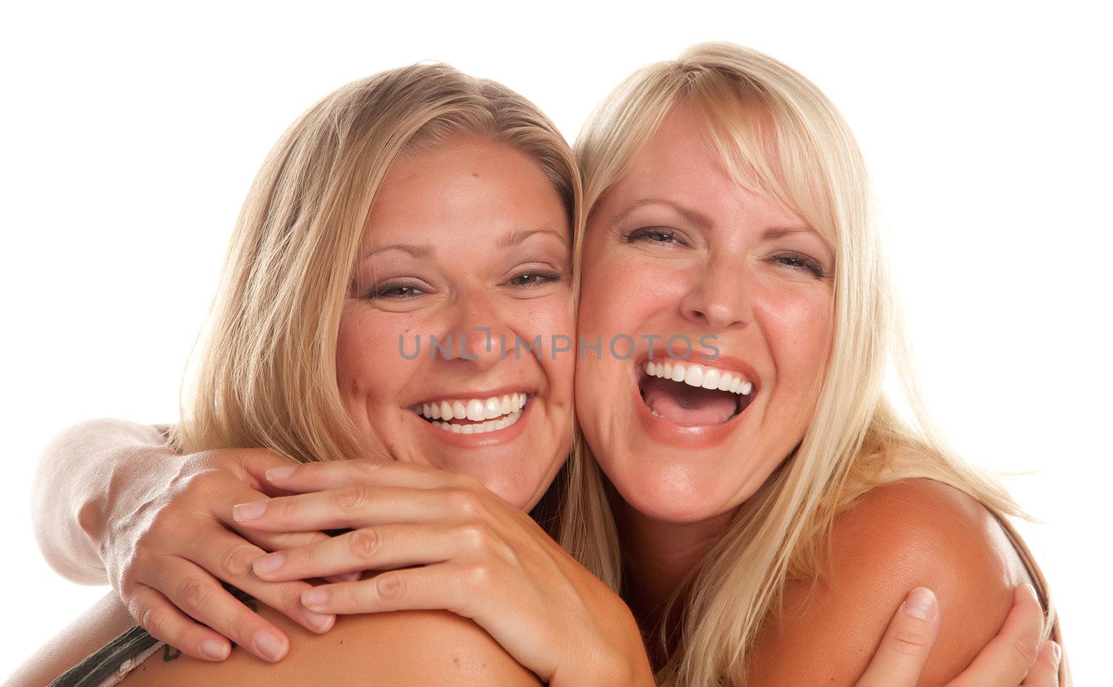 Two Beautiful Sister Laughing Isolated on a White Background.