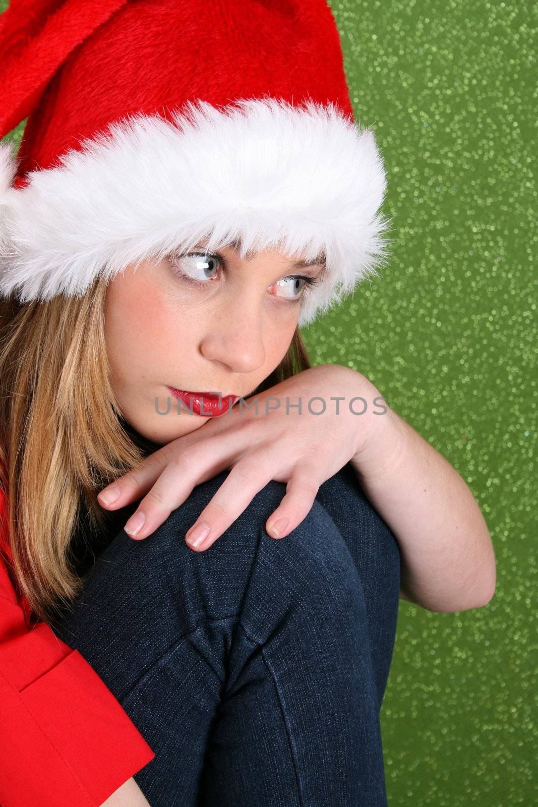 Christmas teen in deep thought, looking into the distance