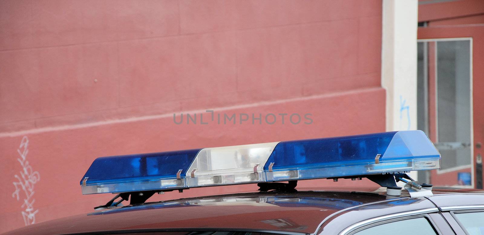 top of a police car with blue lights