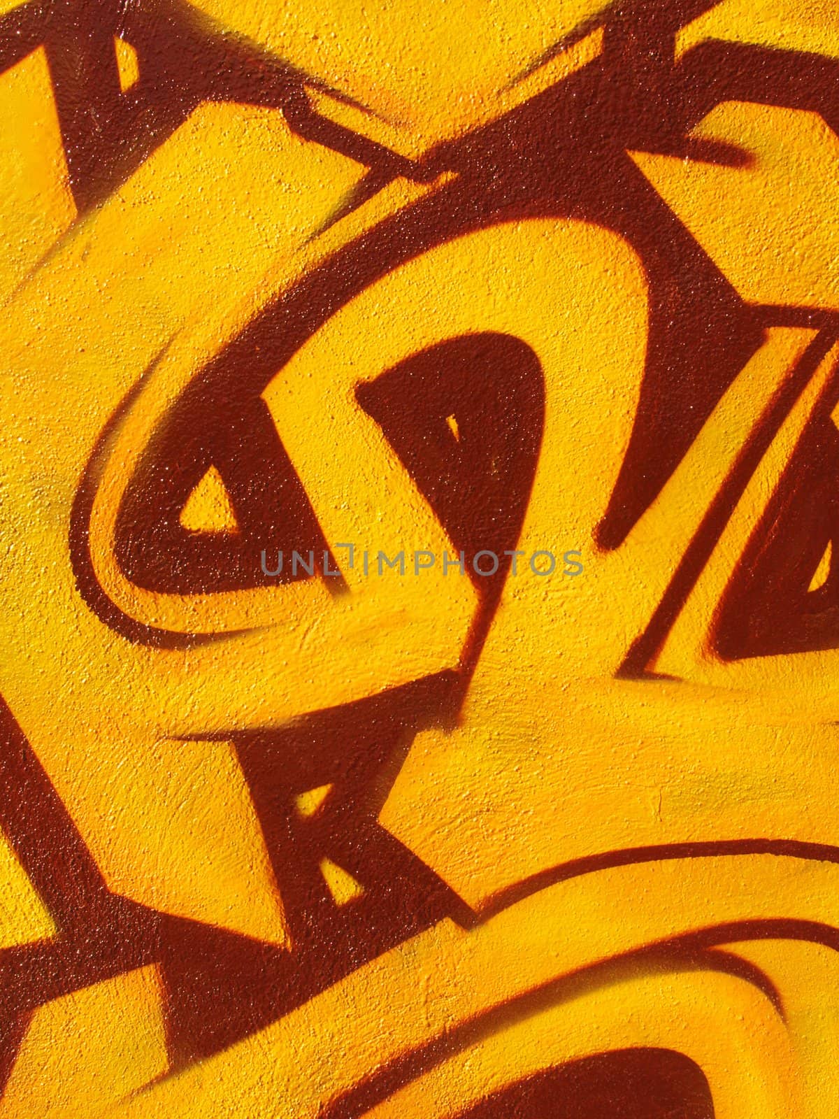 a close-up image of an orange graffiti