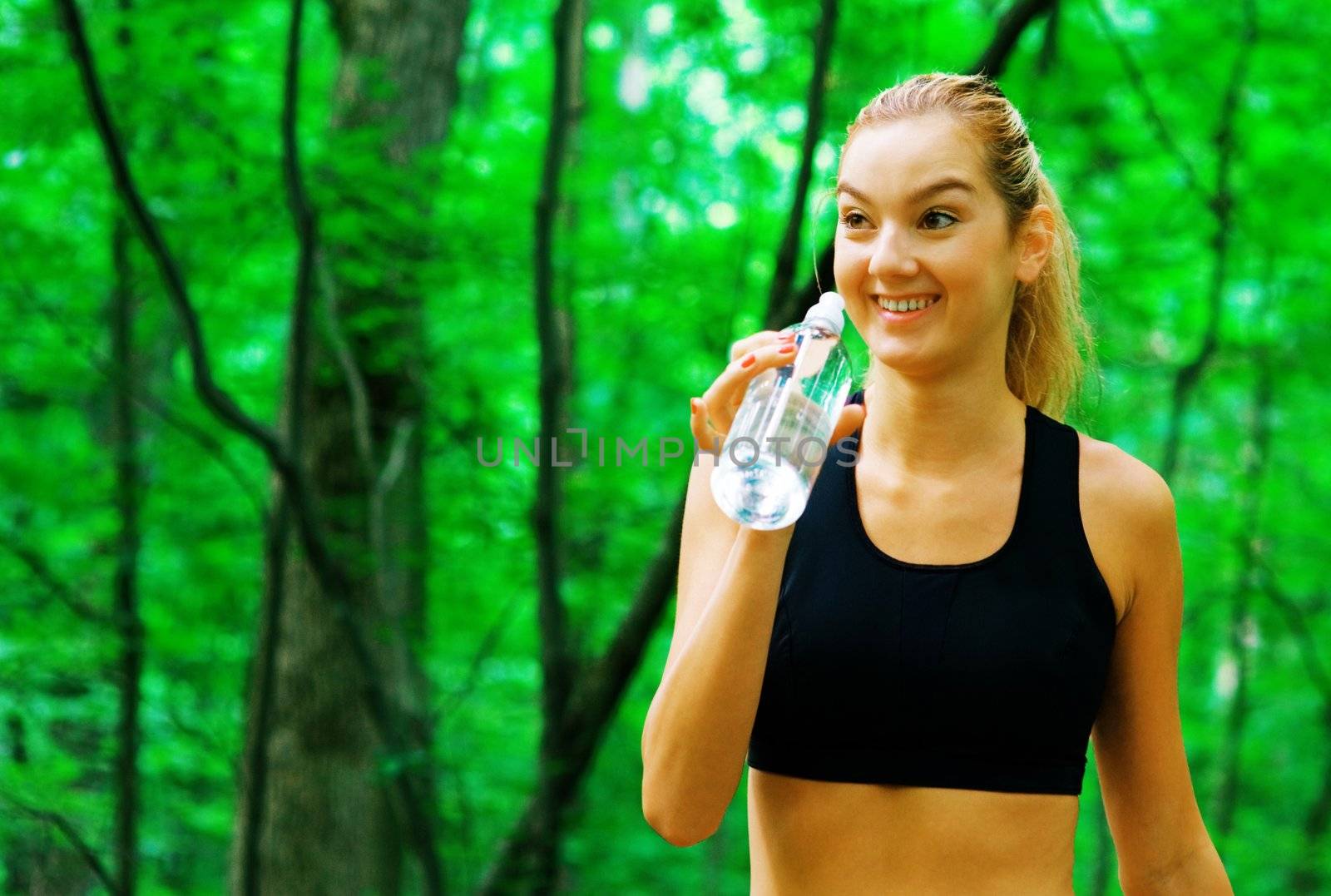 Blonde haired woman exercising, from a complete series of photos.