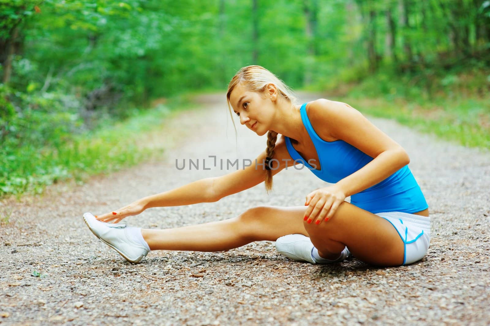 Woman runner exercising, from a complete series of photos.