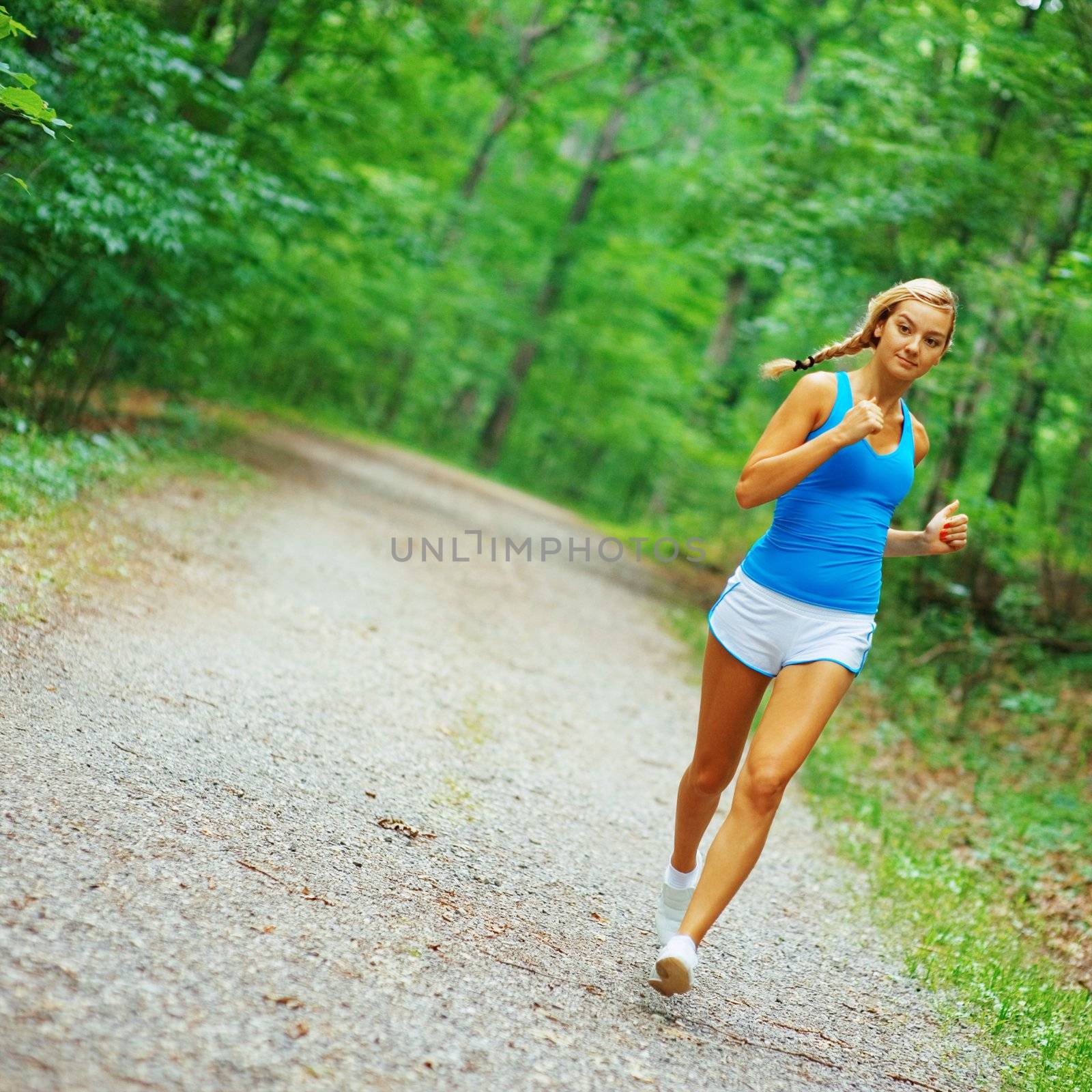 Woman runner exercising, from a complete series of photos.