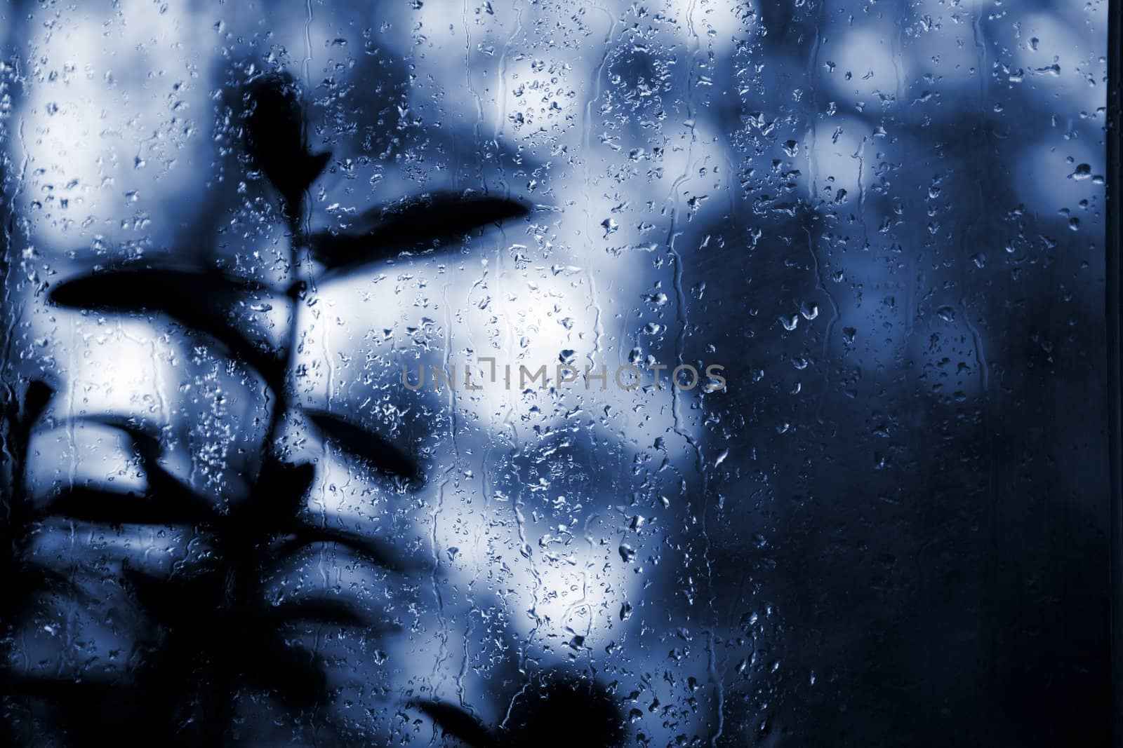 Background. Droplets and jets of water in bright light.