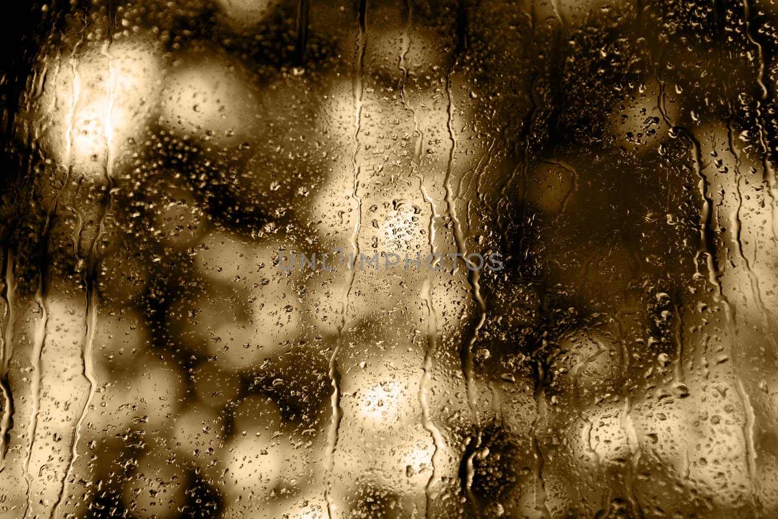 Background. Droplets and jets of water in bright light.