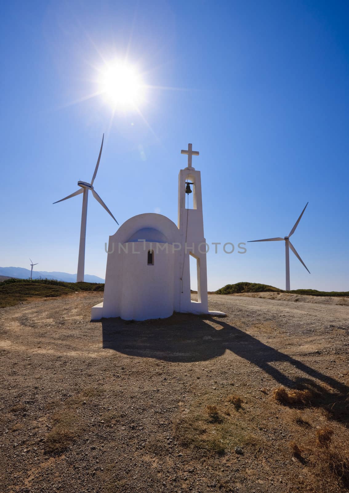 Mountain landscape. Chapel.Windmill. Crete. Greece.