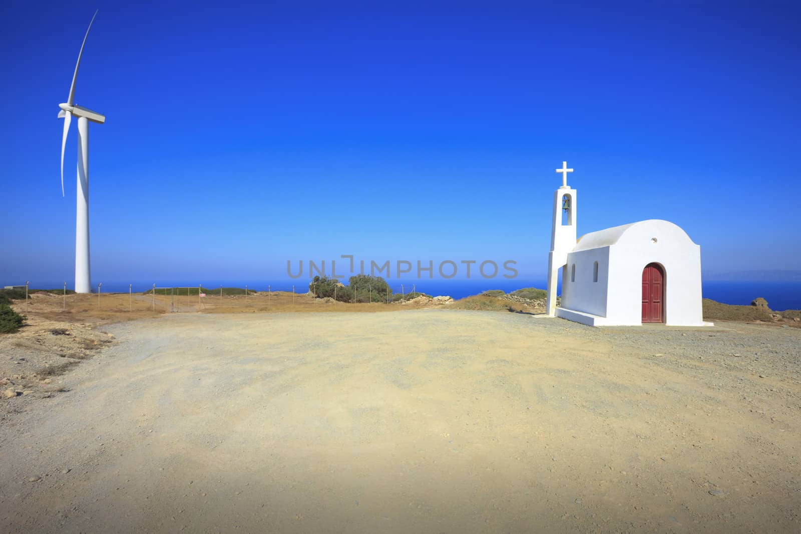 Mountain landscape. Chapel.Windmill. Crete. Greece.