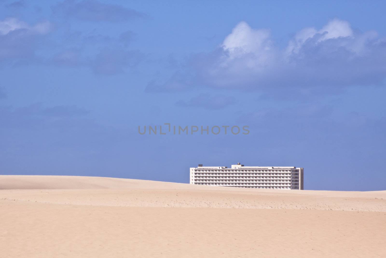 Modern hotel in the midle of the sandy desert.