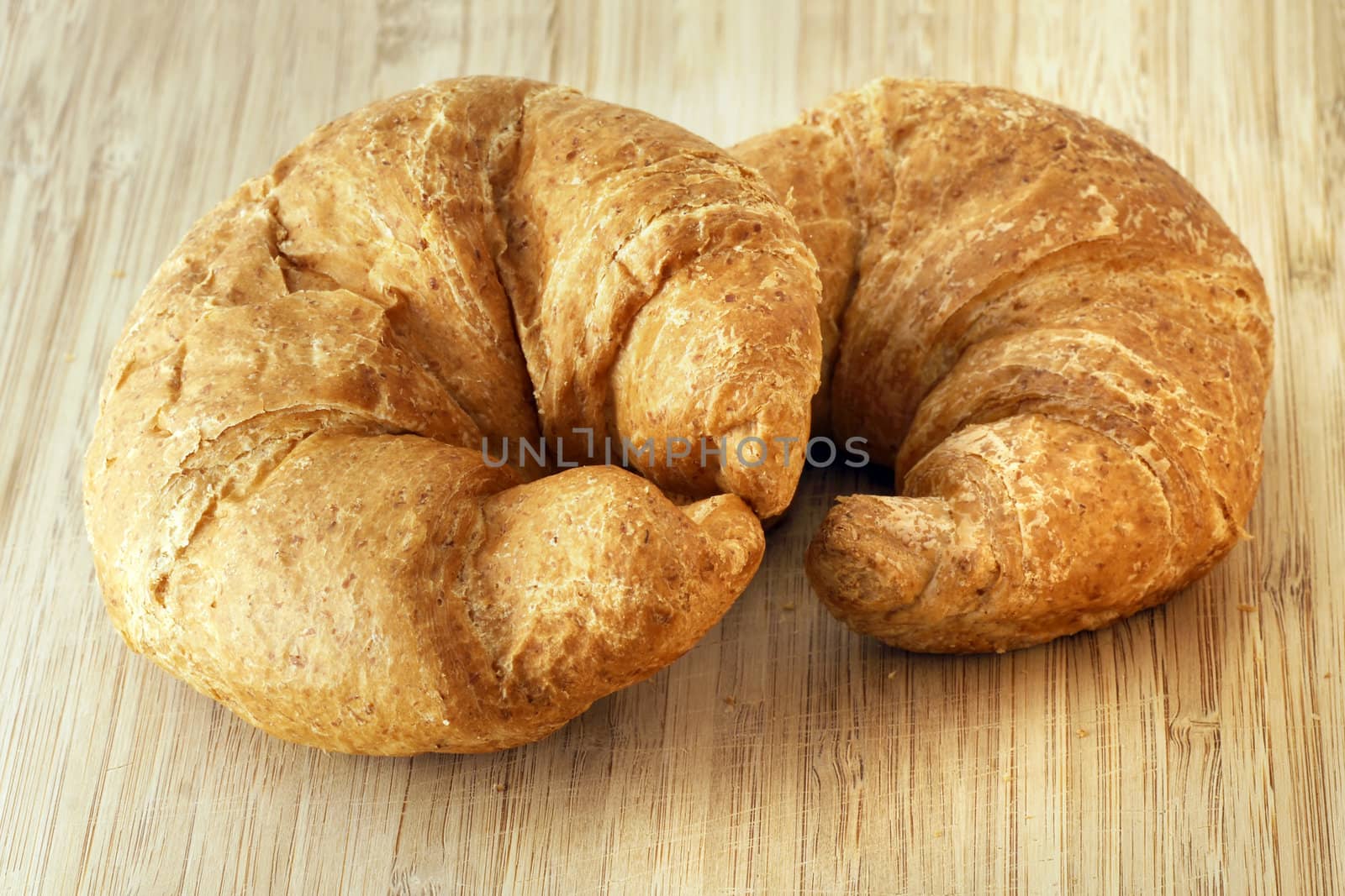 Two whole wheat croissants by Mirage3