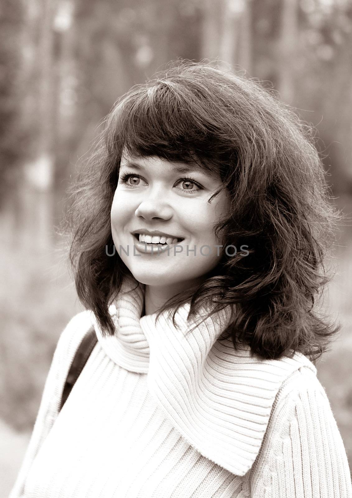 Portrait of a young smiling brunette