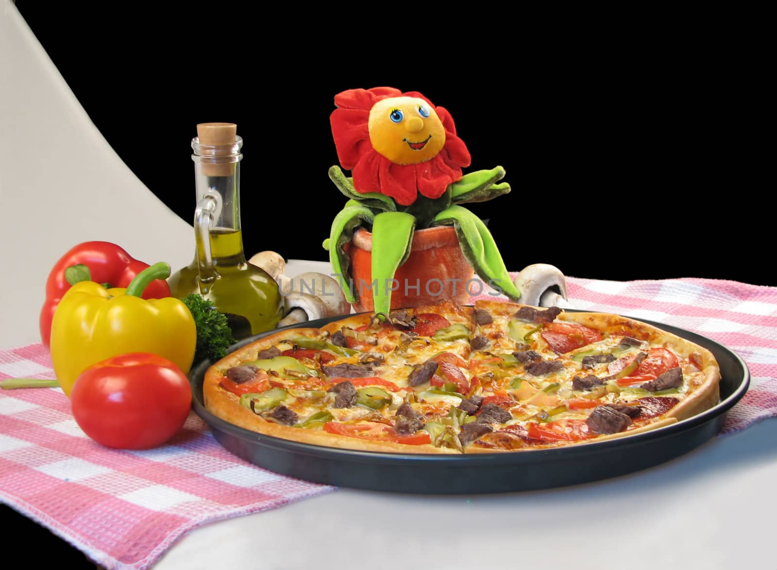 Pizza with a decorative toy