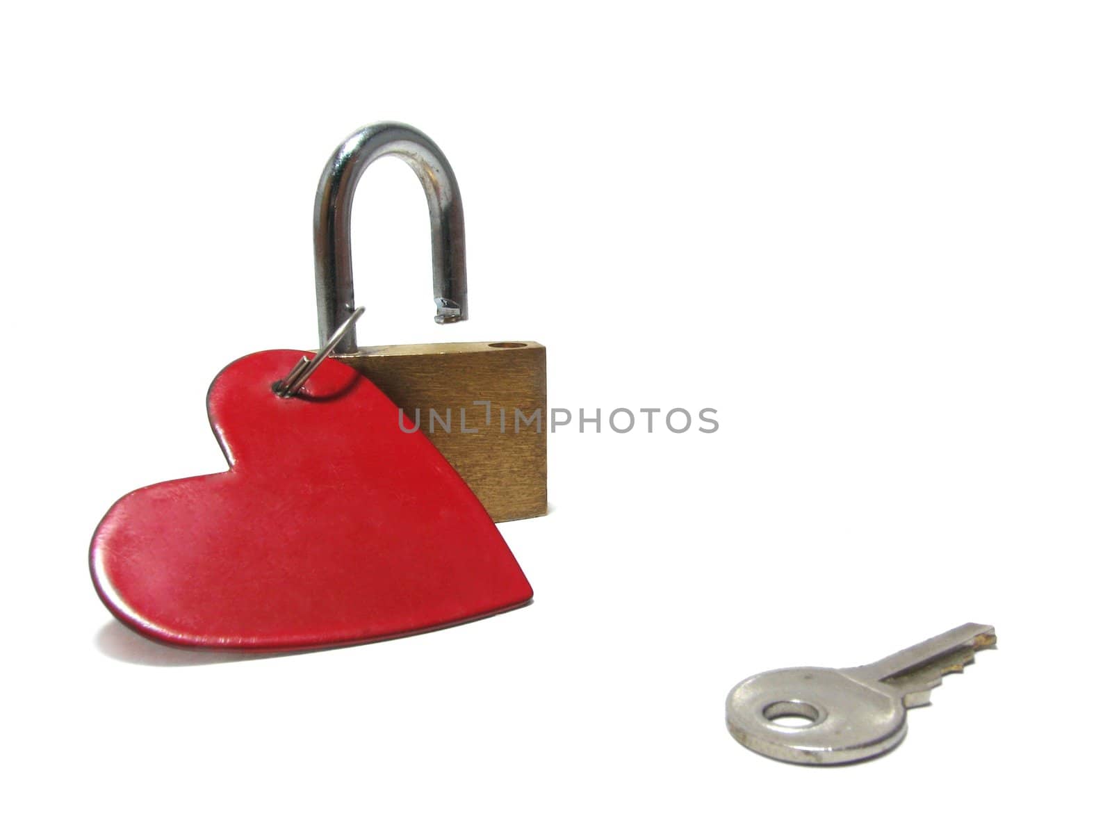 Valentine, a composition from heart, the padlock, and key. It is isolated on a white background