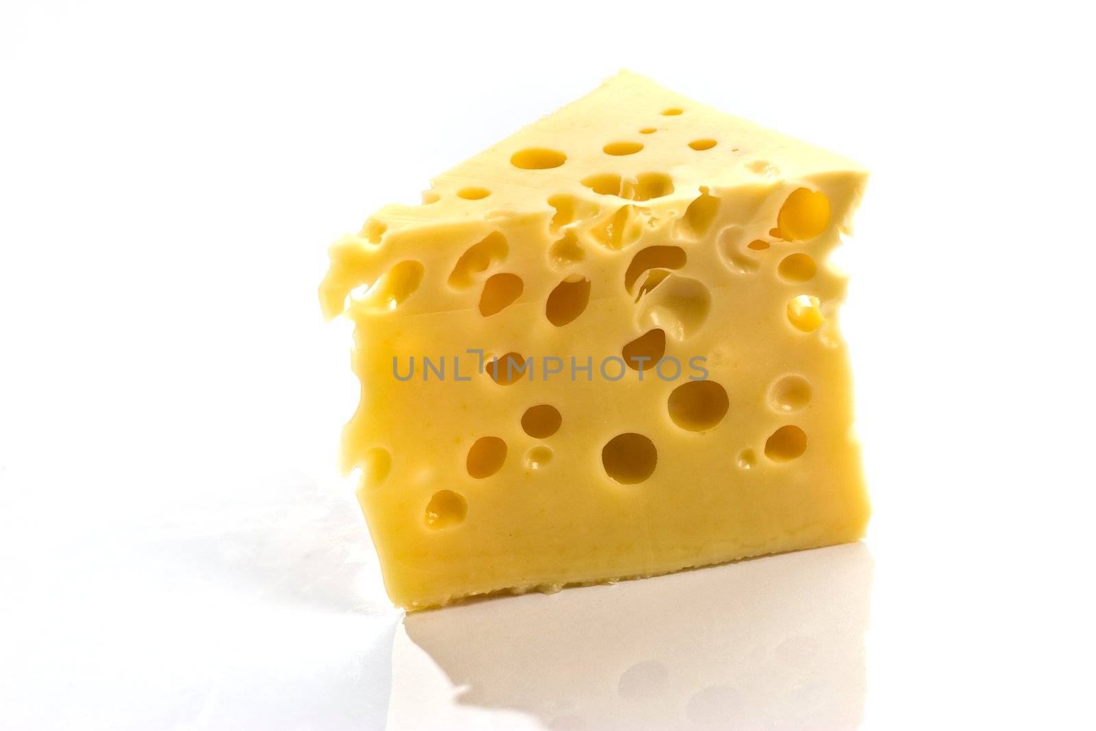 Piece of cheese on a white background