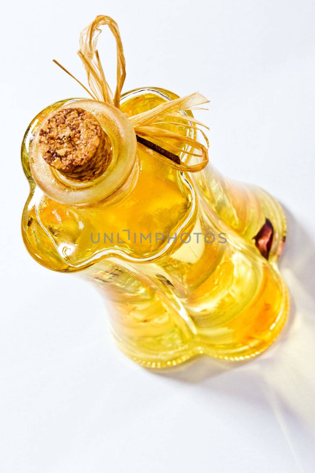 Olive oil bottle full close up, foodstuff
