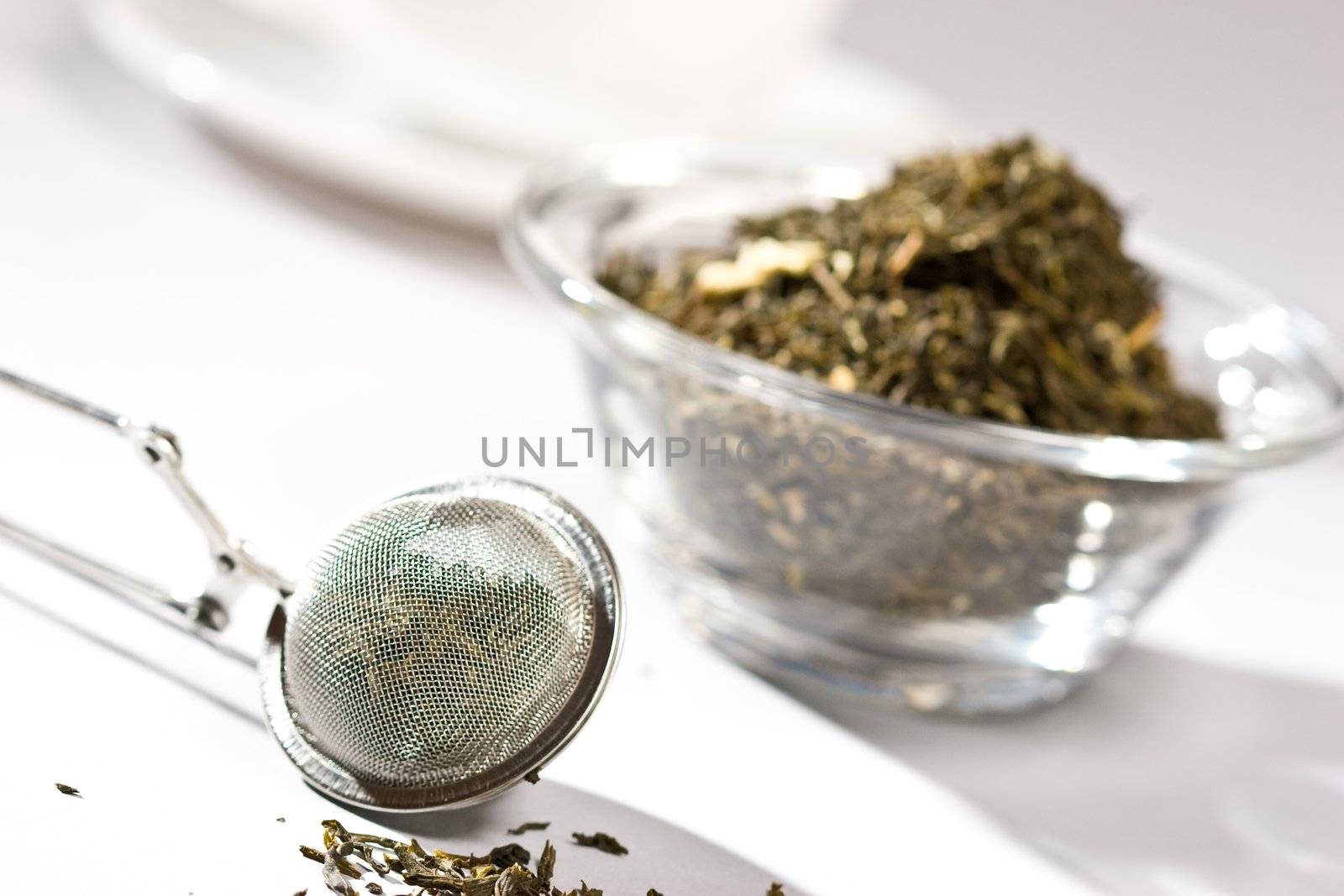 Macro pic of a tea STRAINER with TEA LEAFS
