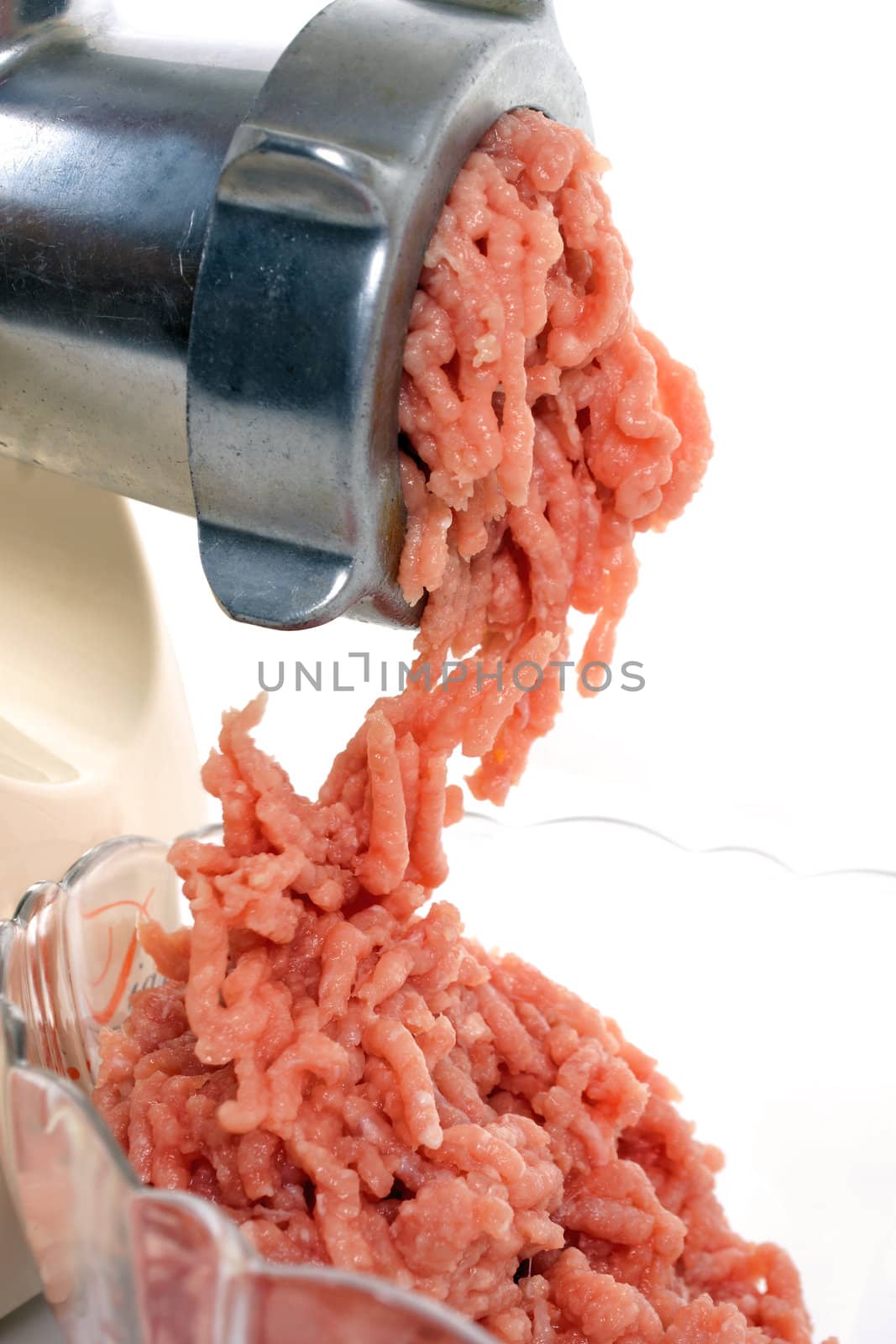 Mince meat with old device close-up