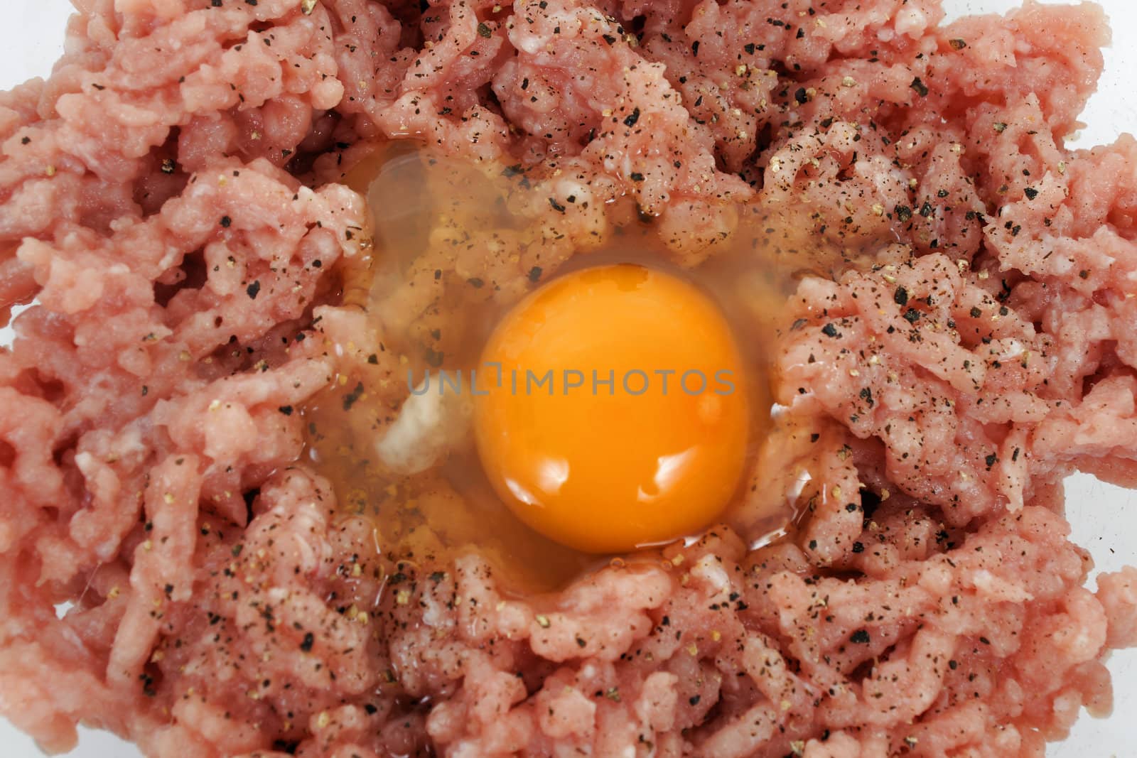 Mince meat with raw egg, close-up