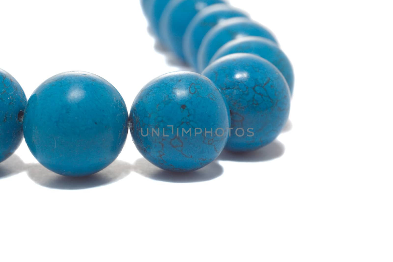 close-up blue necklace, isolated on white