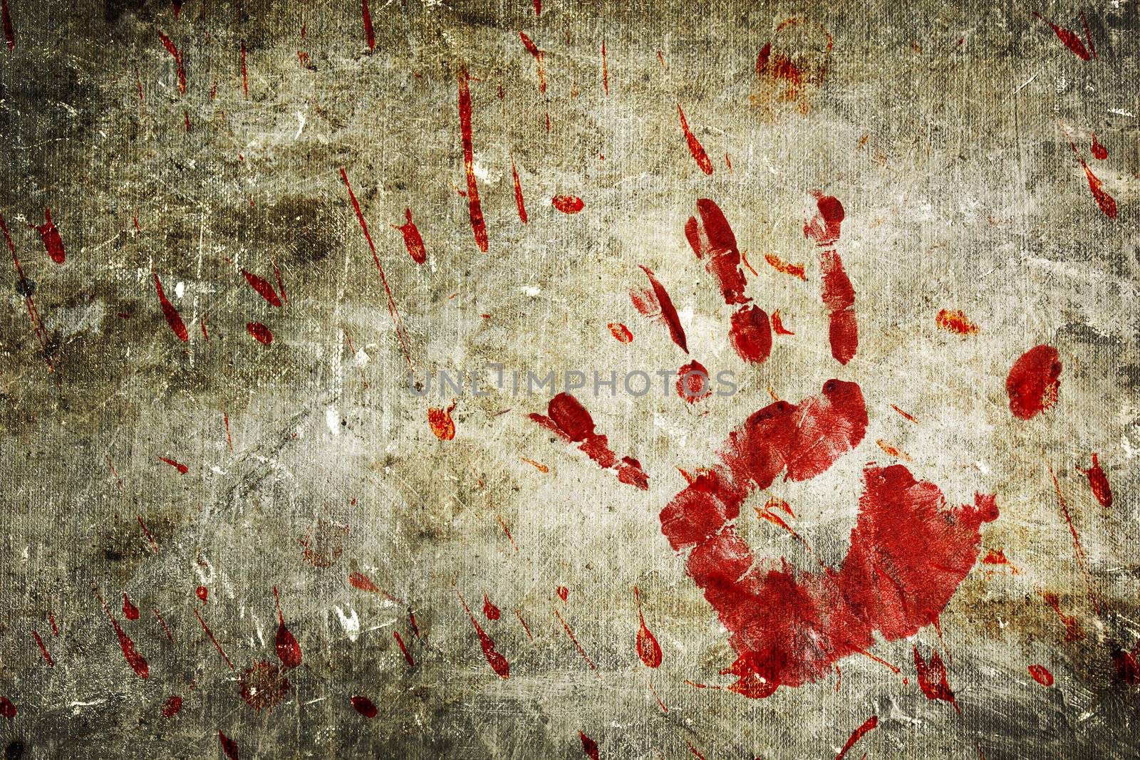 Bloody hand print and blood splatter on a grungy wall.