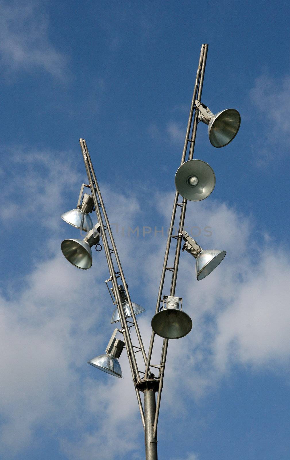 projector with multiple lamp on blue sky background