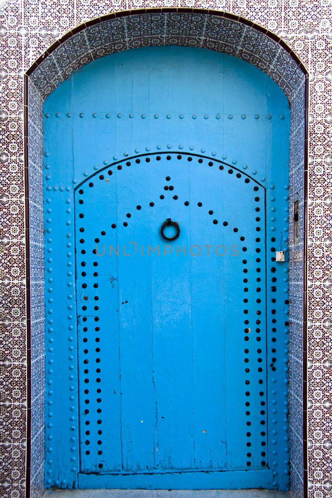 Traditional light blue, vintage, wooden, moorish door.