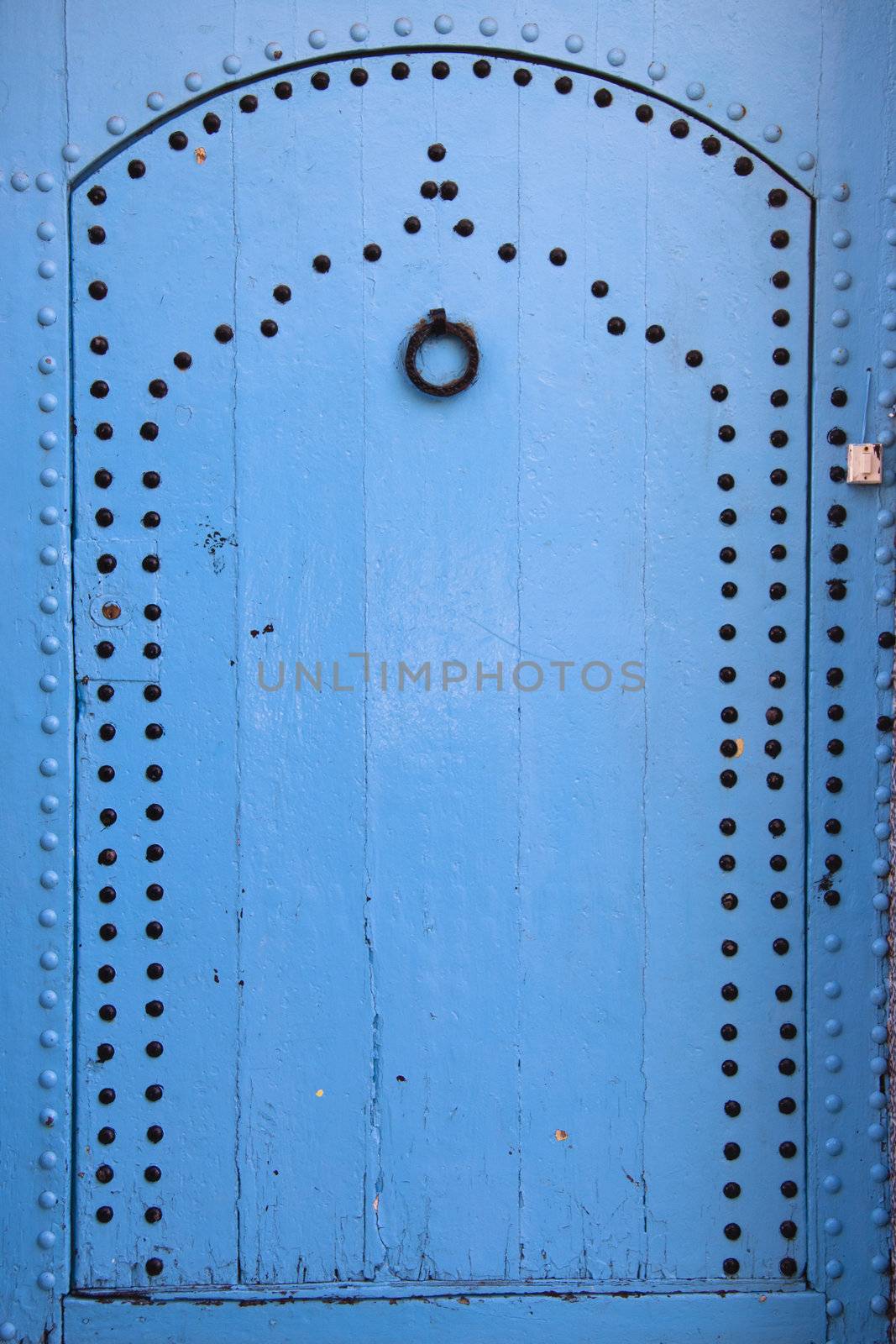 Traditional light blue, vintage, wooden, moorish door.