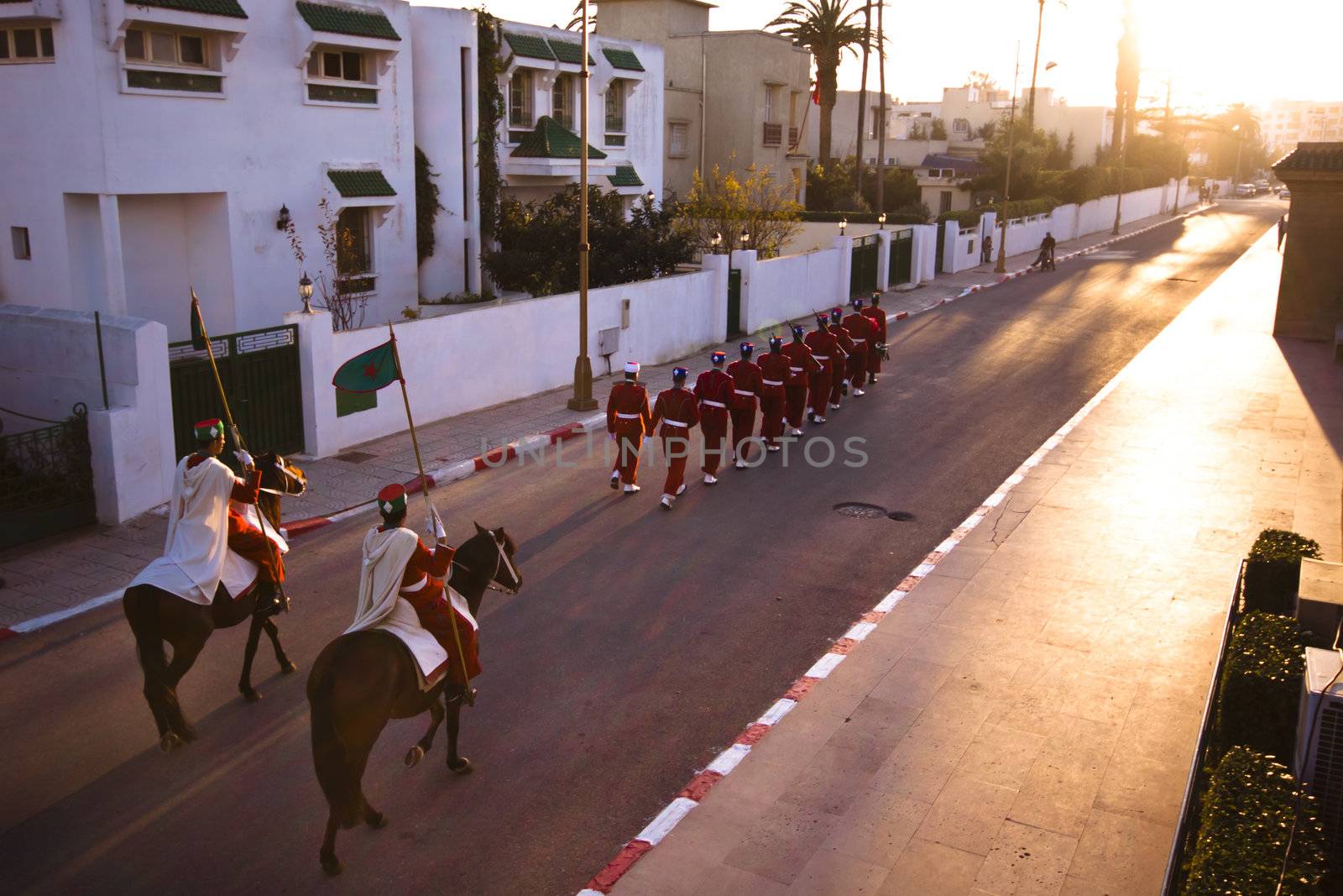 Moroccan guard of honour wallking down the street