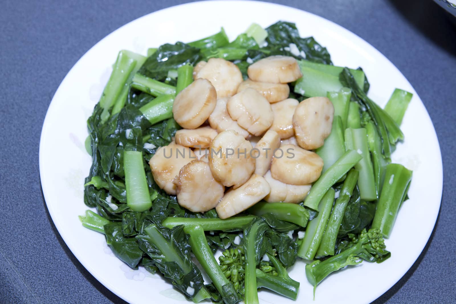 Stir Fry Seafood Scallops Shellfish and Green Chinese Broccoli Vegetable