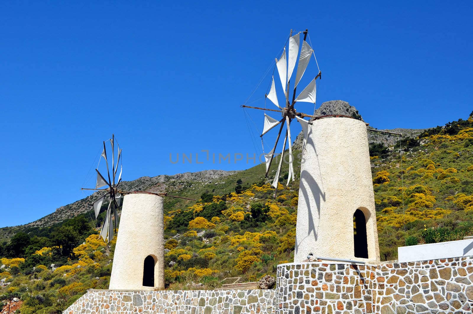 Travel photography: traditional wind mills in the Lassithi plateau, Crete.