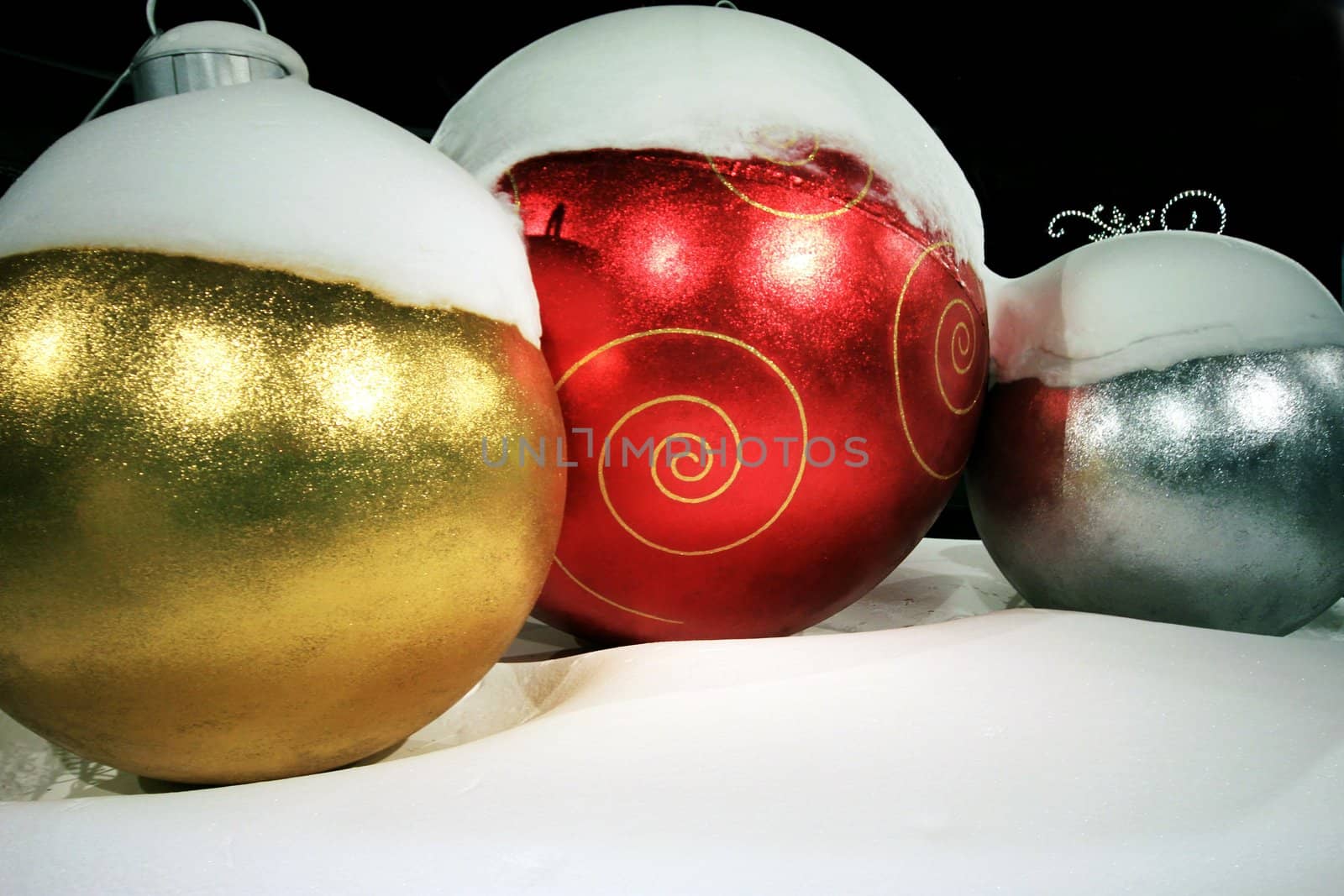 Snow covered Christmas decorations on display