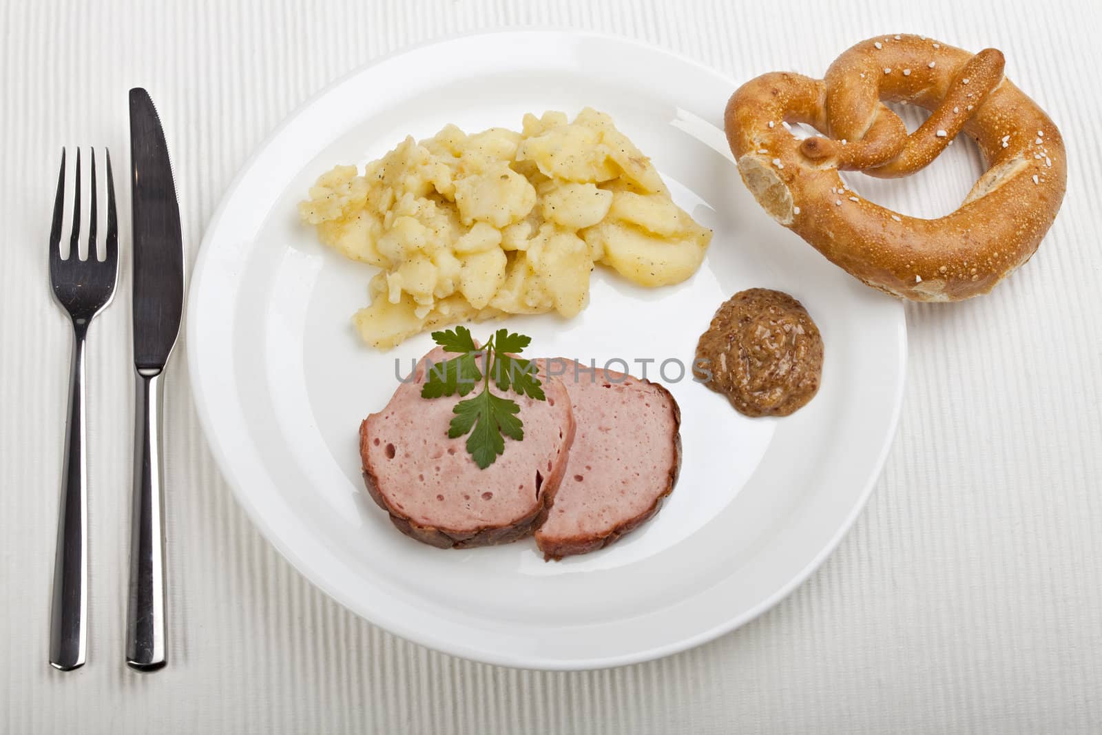 baked bavarian meat loaf on a wooden desk