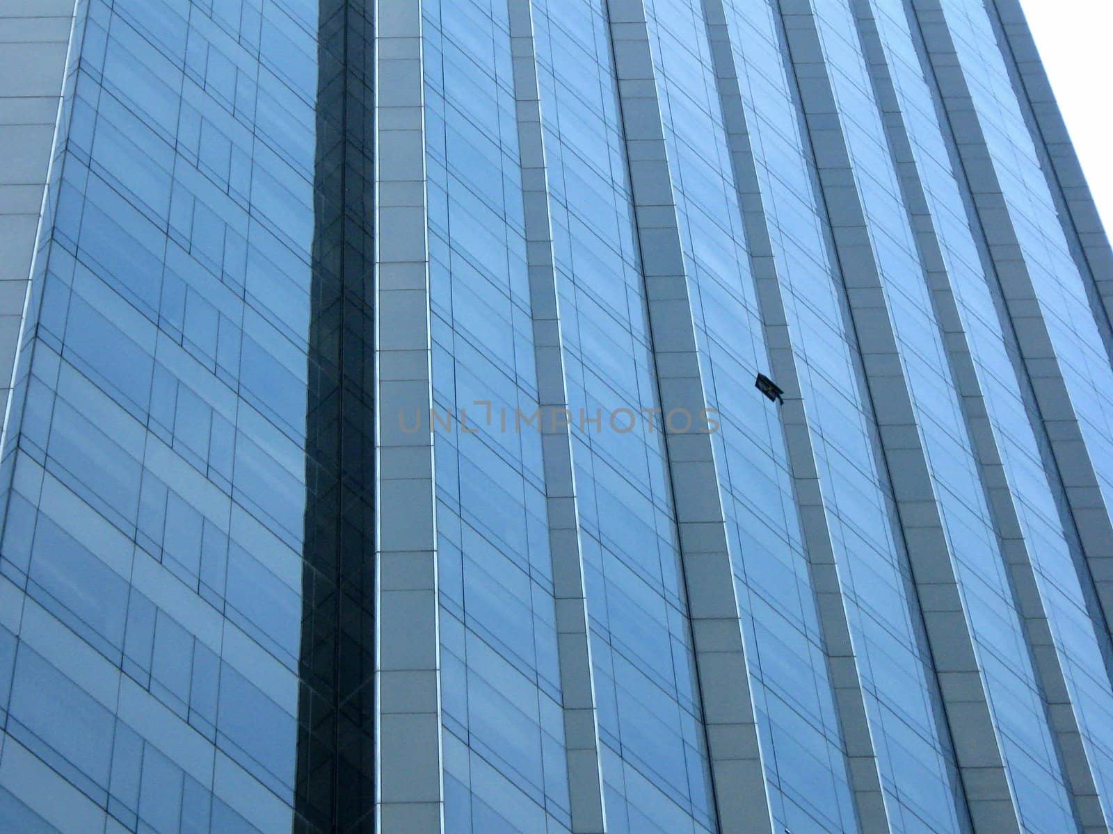 Open window on a tall building in the middle of the city
