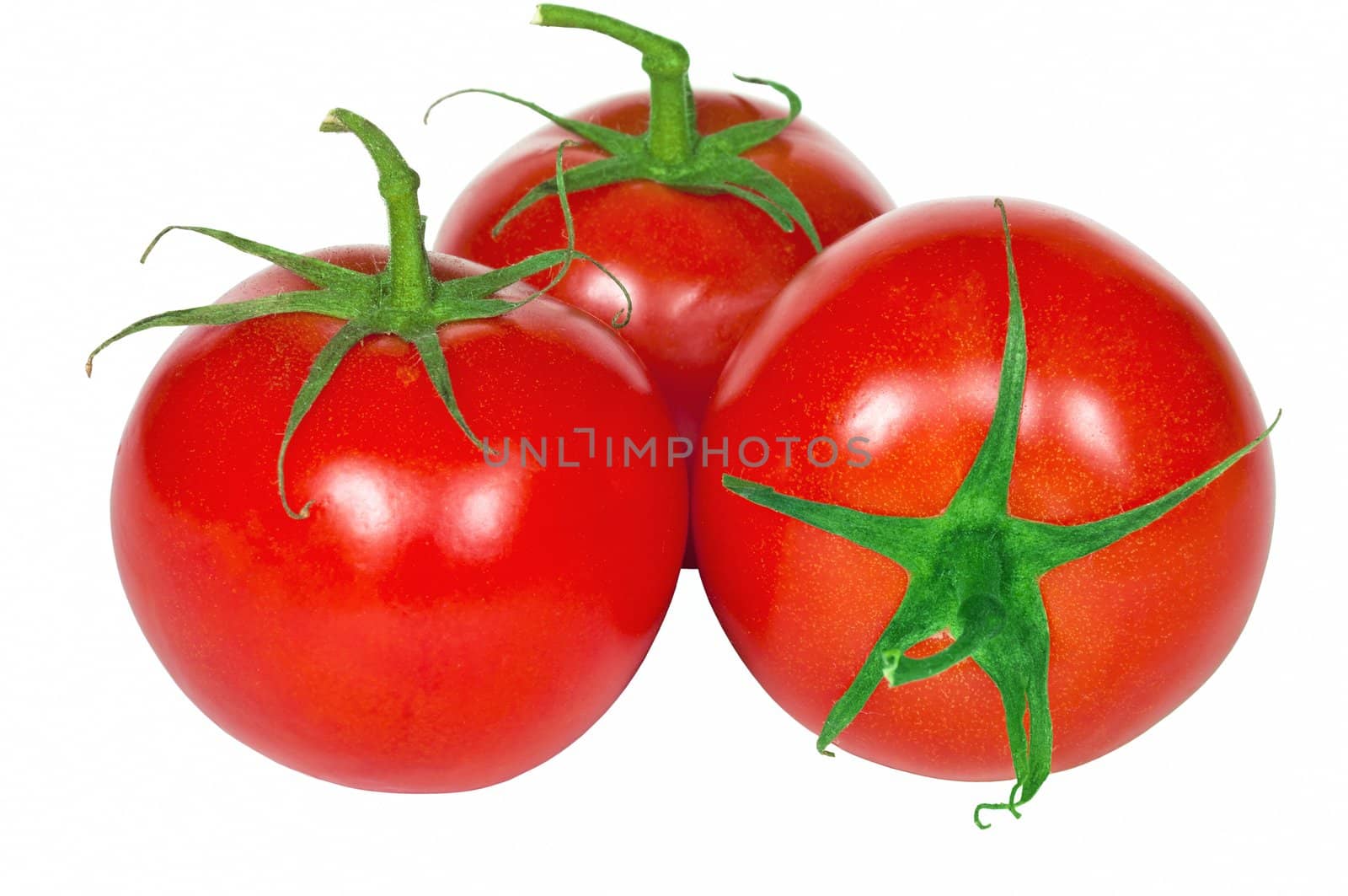 Three fresh tomatoes isolated on the white background. by lobzik