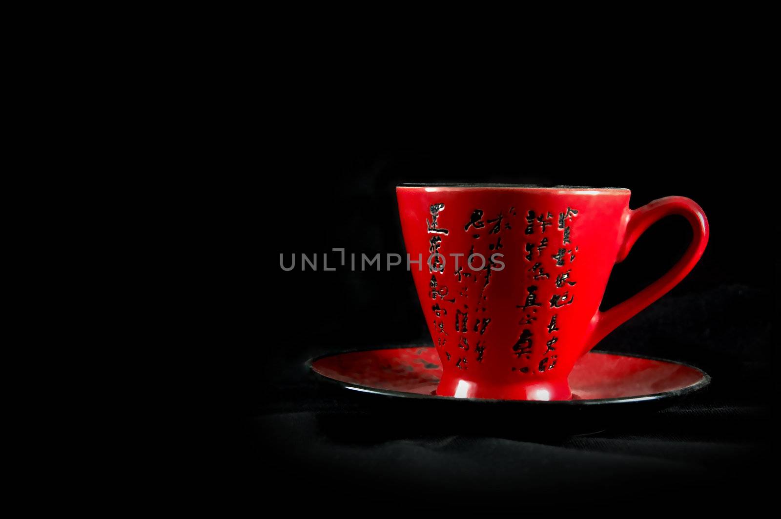 Chinese cup on a black background