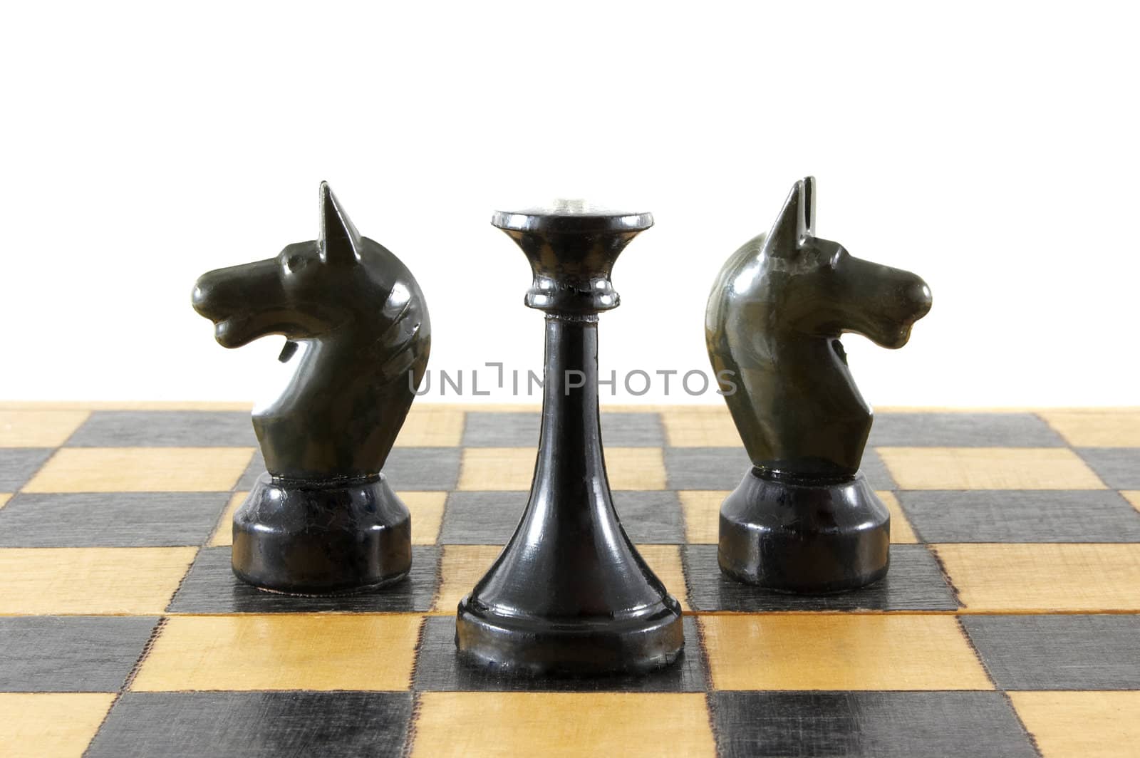 Chess battle on white background