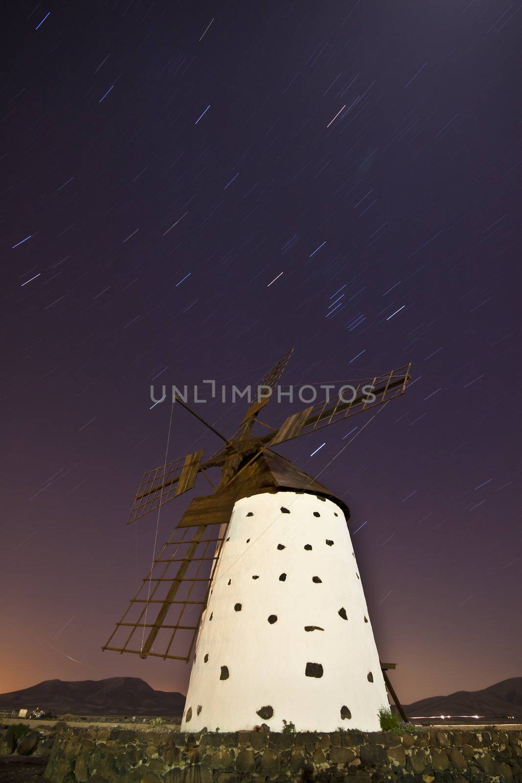 Night shot of a traditional windmill at the Fuertaventura, Canary Islands