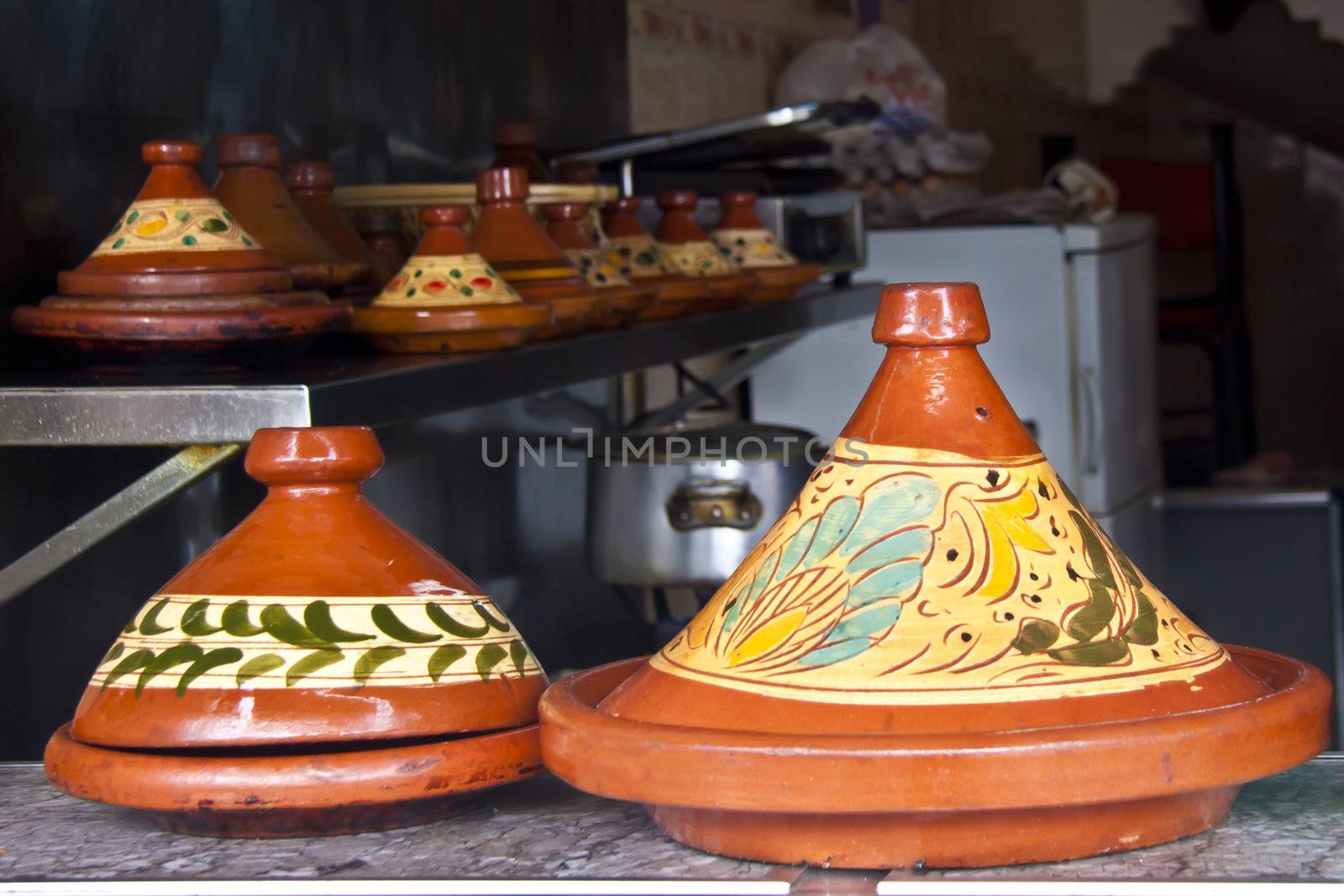 Tagine - traditional maroccan meal, cooked and served in a special ceramic pot