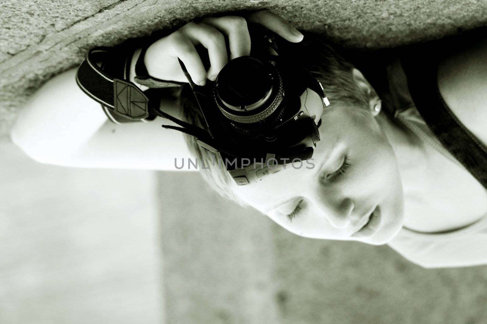 Artistic picture of a tender young girl with the camera