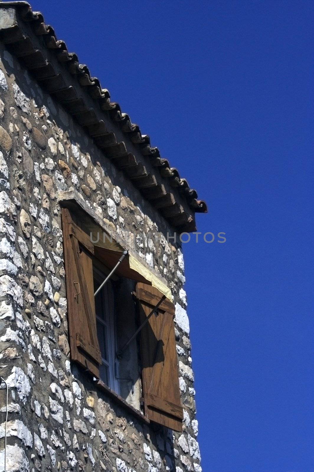 Window with shutters in the medieval castle