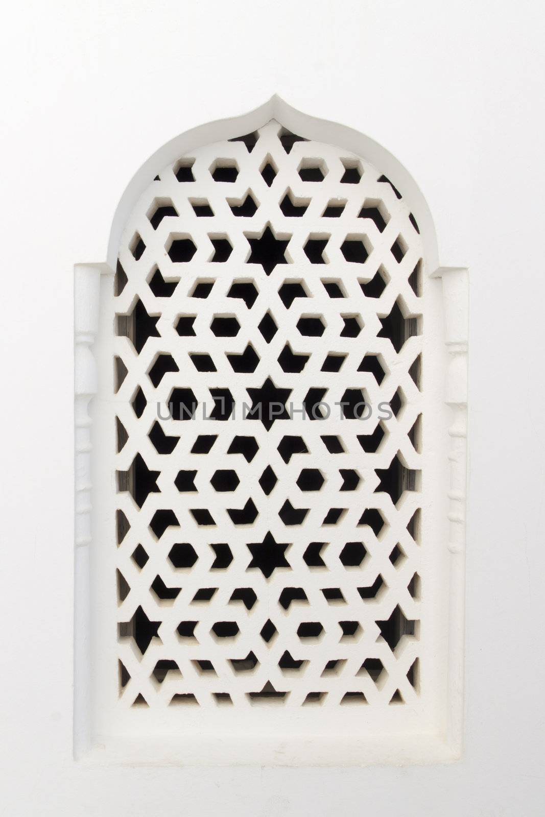 Traditional maroccan window, with a typical arabic ornament