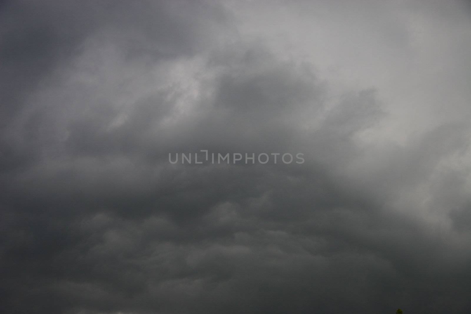 cloudscape of stormy looking clouds of dark greys