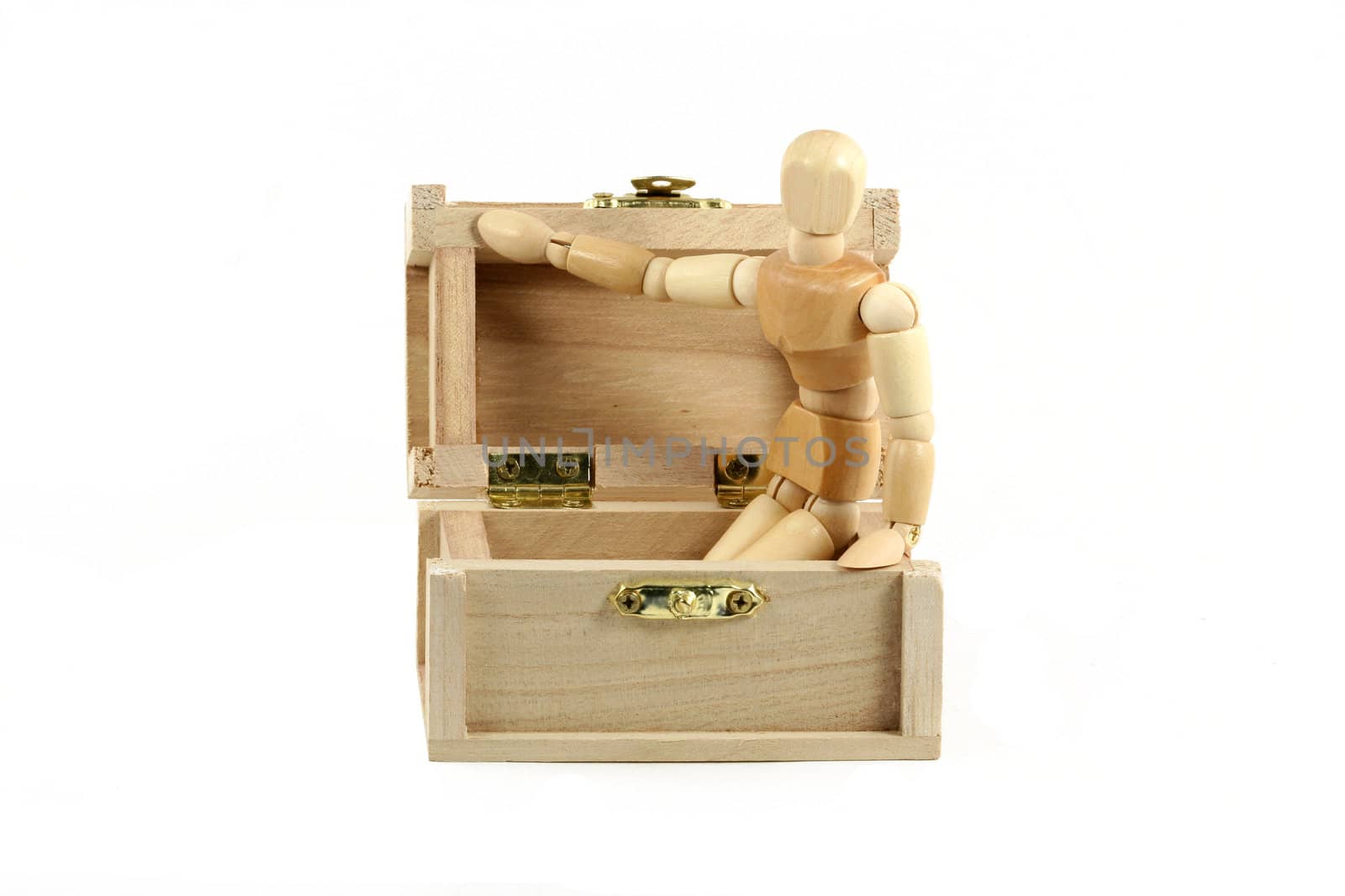 A Wooden manikin in treasure chest