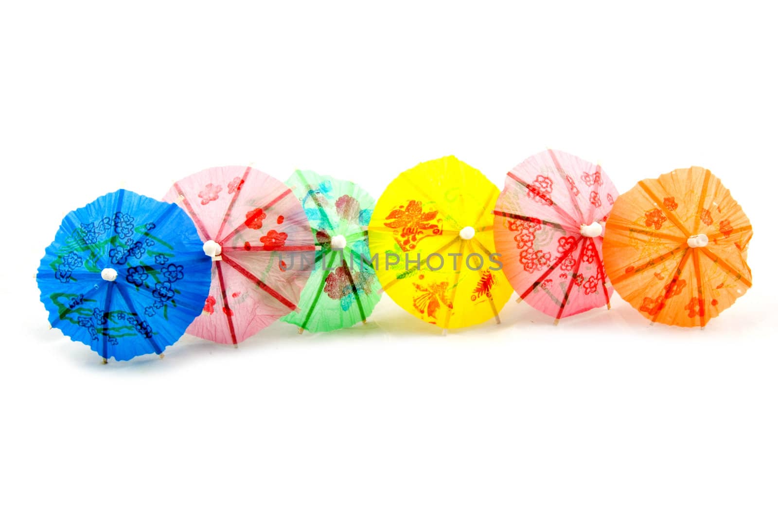 colorful straw parasol isolated on a white background